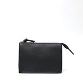 Pocket piccola in pelle martellata nera, pochette da viaggio e per uso quotidiano, realizzata da Pianigiani Bags.